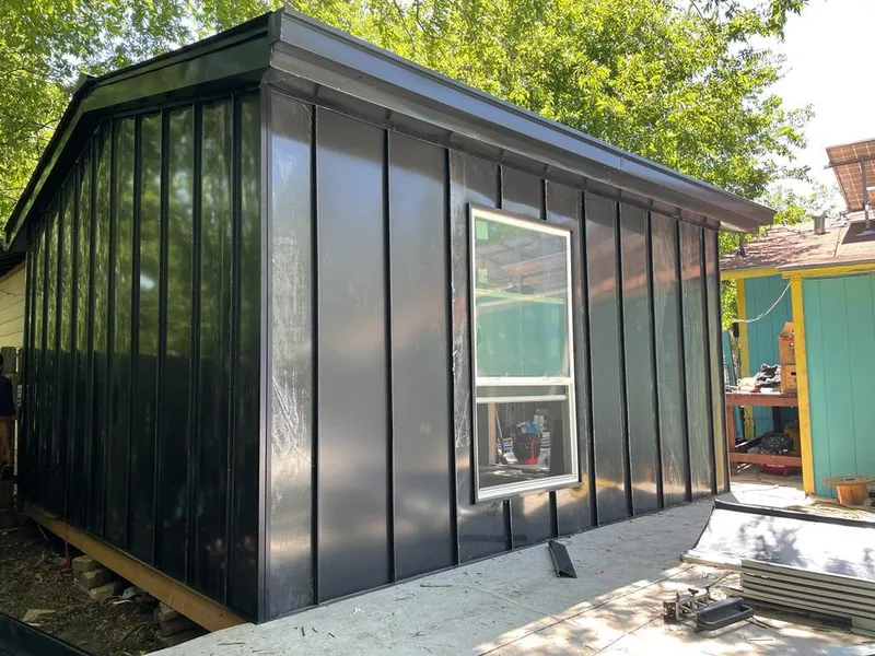 Black standing seam metal wall panels for Roof Inspection in Brandon